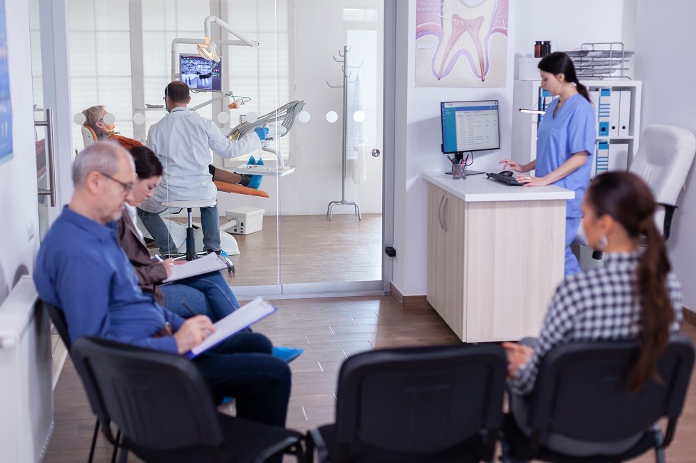 newly established hospital reception area with staff attending to patients