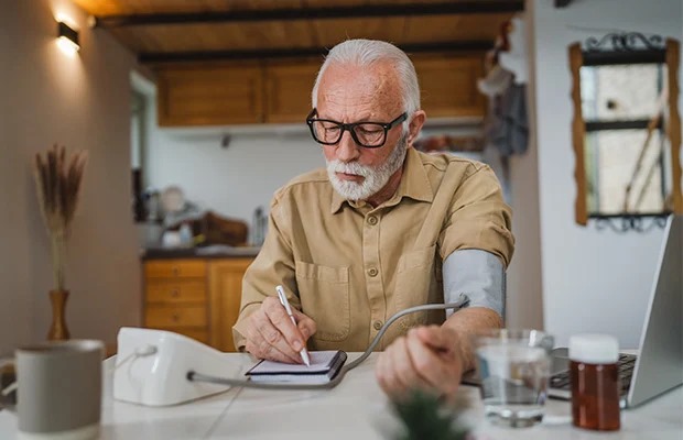 Family using a BP monitor at home